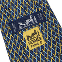 エルメス HERMES 総柄 9cm ネイビー×オレンジ シルク ネクタイ 紺 黄色 金具 スパナ