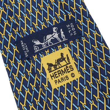 エルメス HERMES 総柄 9cm ネイビー×オレンジ シルク ネクタイ 紺 黄色 金具 スパナ