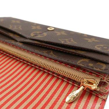 ルイヴィトン LOUIS VUITTON ポルトフォイユ サラ M60415 モノグラム モノグラムキャンバス 長財布 ゴールド金具 茶 トランクプリント 二つ折り