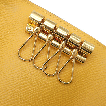 エルメス HERMES セリエ 4連キーケース イエロー系 クシュベル キーケース ゴールド金具 黄色