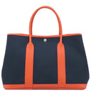 エルメス HERMES ガーデンパーティーPM ブルーマリン×オレンジポピー	 トワルミリタリー ヴァッシュカントリー トートバッグ シルバー金具 紺 トワルミリテール