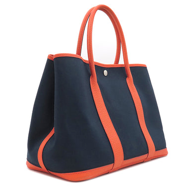 エルメス HERMES ガーデンパーティーPM ブルーマリン×オレンジポピー	 トワルミリタリー ヴァッシュカントリー トートバッグ シルバー金具 紺 トワルミリテール