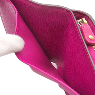 ルイヴィトン LOUIS VUITTON コンパクト ジップ M95218 フューシャ モノグラムキャンバス 二つ折り財布 ゴールド金具 茶 小銭入れ