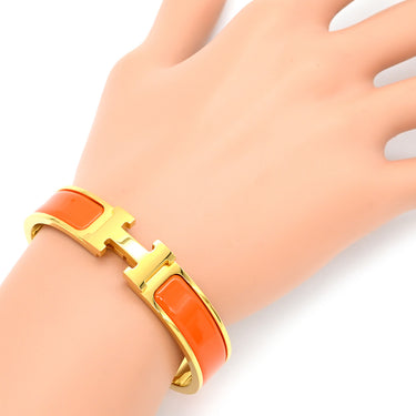 エルメス HERMES クリックH PM オレンジ×ゴールド GP エナメル ブレスレット Hブレス