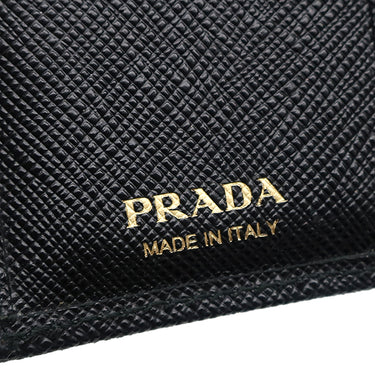 プラダ PRADA サフィアーノ フィオッコ コンパクト ウォレット NERO レザー 三つ折り財布 ゴールド金具 黒 メタルロゴ リボンモチーフ SAFFIANO FIOCCO