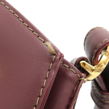 カルティエ Cartier マストライン ボルドー レザー ショルダーバッグ ゴールド金具 巾着 赤