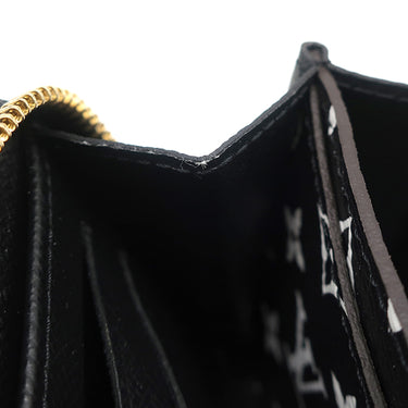 ルイヴィトン LOUIS VUITTON モノグラムジャングル ジッピーコインパース M67878 ブラック×イエロー レザー ジャイアントモノグラムキャンバス コインケース ゴールド金具 黒 黄色 アニマル柄