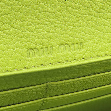 ミュウミュウ MIU MIU 二つ折り ロゴプレート 5MH109 PAVONE レザー 長財布 シルバー金具 黄緑 ロングウォレット カードケース付き