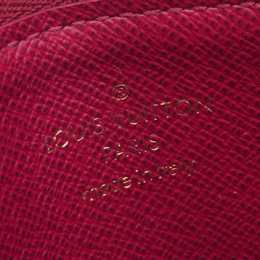 ルイヴィトン LOUIS VUITTON ポルトカルト ジップ M67889 フューシャ モノグラムキャンバス レザー コインケース ゴールド金具 茶 フラグメントケース