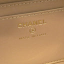 シャネル CHANEL ジップ アラウンド バニティ ホワイト ラムスキン ショルダーバッグ ゴールド金具 ココマーク プレート アイボリー