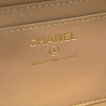 シャネル CHANEL ジップ アラウンド バニティ ホワイト ラムスキン ショルダーバッグ ゴールド金具 ココマーク プレート アイボリー