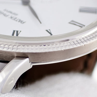 腕時計 パテックフィリップ PATEK PHILIPPE カラトラバ 5119G-001 手巻き メンズ OH済 K18WG無垢 白 ローマン クル・ド・パリベゼル