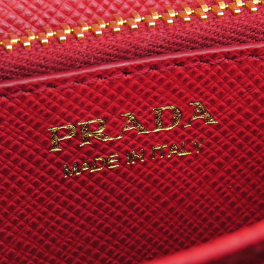 プラダ PRADA サフィアーノ コンパクトウォレット 1MH026 FUOCO レザー 二つ折り財布 ゴールド金具 赤 メタルロゴ ミニウォレット