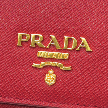 プラダ PRADA サフィアーノ コンパクトウォレット 1MH026 FUOCO レザー 二つ折り財布 ゴールド金具 赤 メタルロゴ ミニウォレット