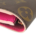 ルイヴィトン LOUIS VUITTON ポルトフォイユ エミリー M64202 モノグラム×ホットピンク モノグラムキャンバス 長財布 ゴールド金具 フラワーチャーム 二つ折り