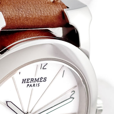 腕時計 エルメス HERMES Hウォッチ ロンド HR1.210 クオーツ レディース ホワイト 白 放射状 ラジアル アラビア