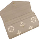 ルイヴィトン LOUIS VUITTON ポルトフォイユ サラ NM M81049 トゥルトレール×クレーム モノグラムアンプラント 長財布 ゴールド金具 ベージュ