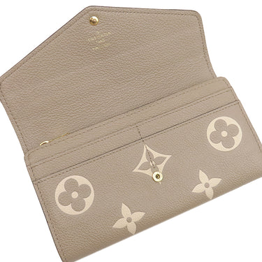 ルイヴィトン LOUIS VUITTON ポルトフォイユ サラ NM M81049 トゥルトレール×クレーム モノグラムアンプラント 長財布 ゴールド金具 ベージュ