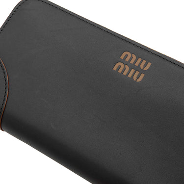 ミュウミュウ MIU MIU ロゴ ラウンドファスナー 5ML506 2CSB ブラック×コニャック カーフ 長財布 ゴールド金具 黒 茶 NERO COGNAC ラウンドジップ