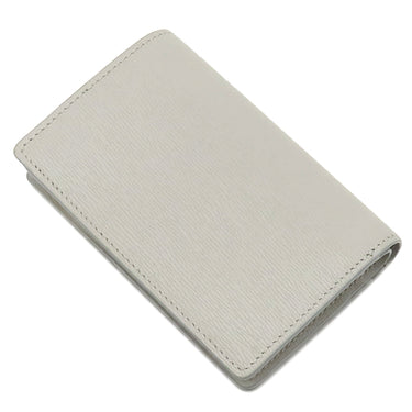 グッチ GUCCI メタル ロゴ 772640 グレー レザー 二つ折り財布 ゴールド金具