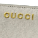 グッチ GUCCI メタル ロゴ 772640 グレー レザー 二つ折り財布 ゴールド金具