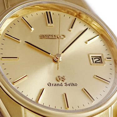 腕時計 グランドセイコー Grand Seiko クォーツ SBGS006 9587-8010 クオーツ メンズ K18YG無垢 シャンパン バー デイト サンレイ