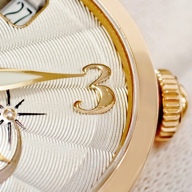 腕時計 ジラールペルゴ GIRARD PERREGAUX キャッツアイ 80480 自動巻き レディース K18PG無垢 純正ダイヤ シェル ギョーシェ アイボリー デイト