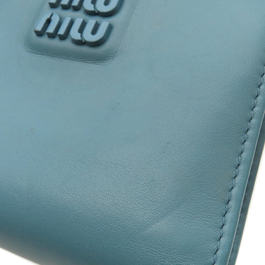 ミュウミュウ MIU MIU ソフティ パデッド マテラッセ ブルー レザー 二つ折り財布 ゴールド金具 水色 ロゴ コンパクト